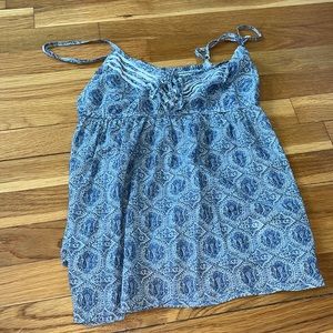 Blue tank top, with adjustable straps that is perfect for any occasion!!